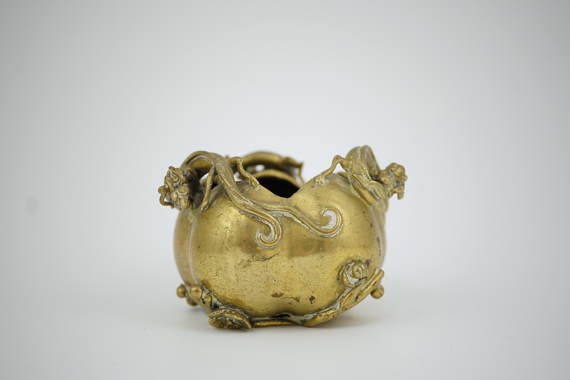 A large Chinese bronze rectangular censer and cover, Xuande seal mark, and a ‘plum blossom and chilong’ bronze censer, both 19th century